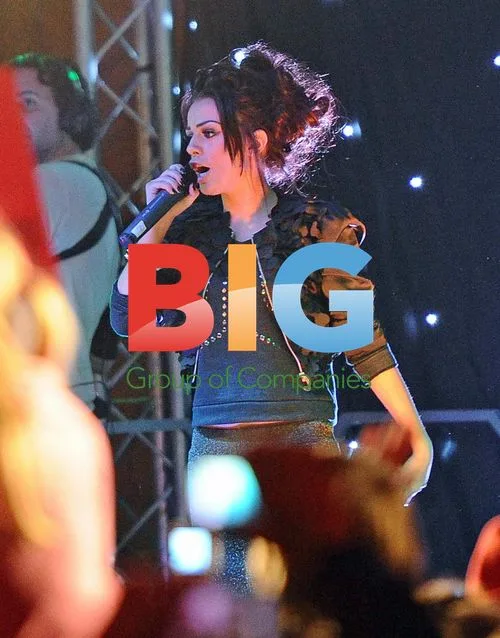 Cher Lloyd performs with Cheryl Cole