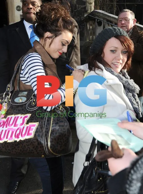 Cher Lloyd visits old school