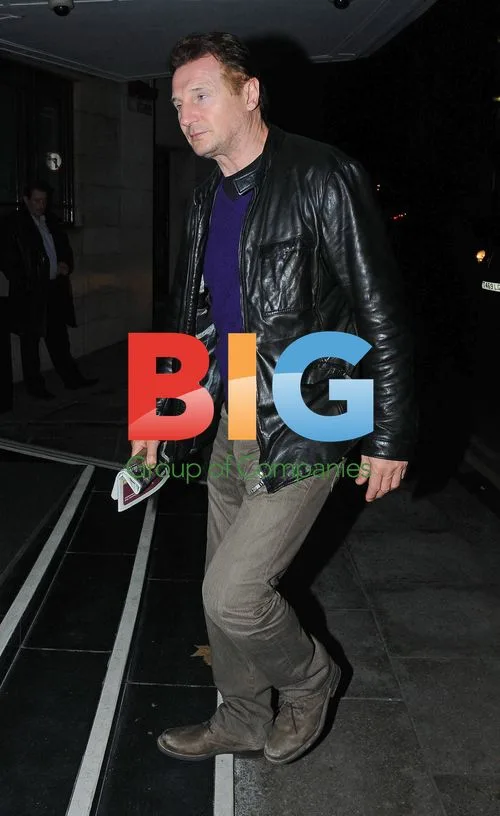 Liam Neeson Arriving at London Hotel