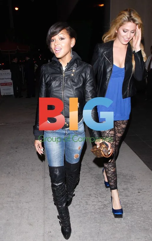 Meagan Good Smiles Outside Trousdale