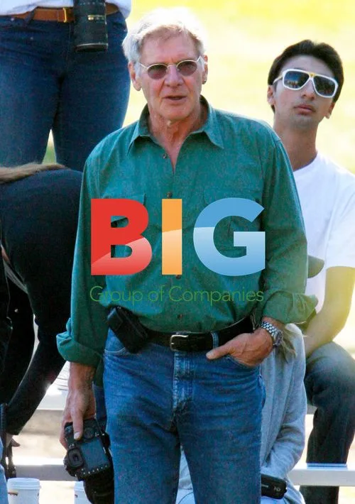 Harrison Ford and Calista Flockhart Watch Son Play Football