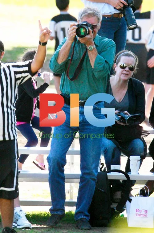 Harrison Ford and Calista Flockhart Watch Son's Flag Football Game