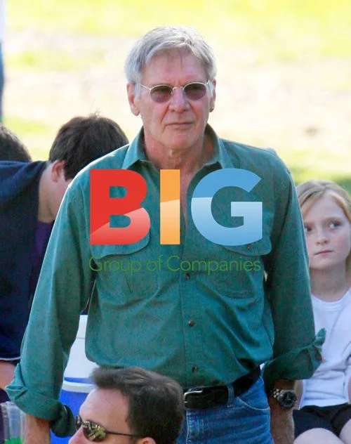 Harrison Ford and Calista Flockhart Watch Son's Game