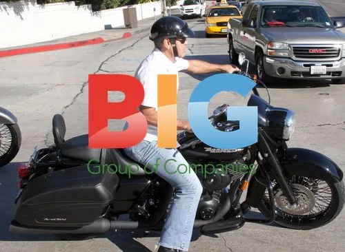 George Clooney Rides Motorcycle