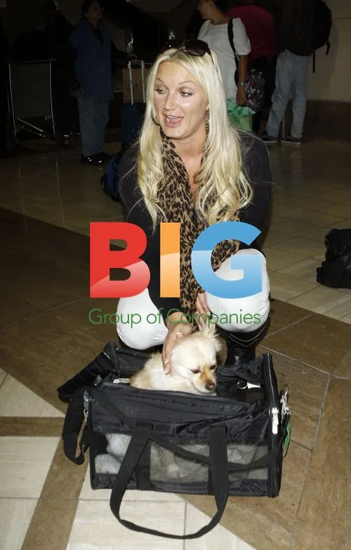 Brooke and Nick Hogan at LAX