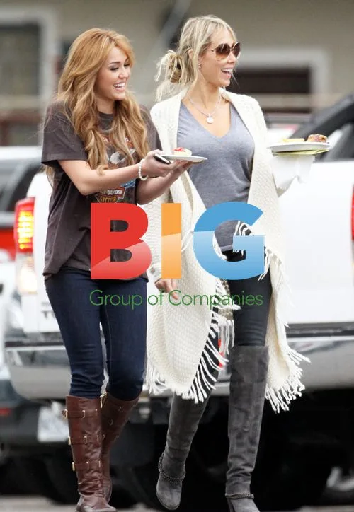 Miley Cyrus visits on 'So Undercover' set