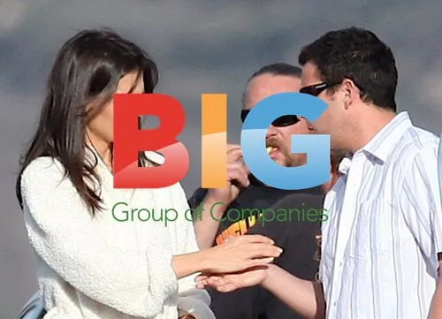 Katie Holmes and Adam Sandler on set