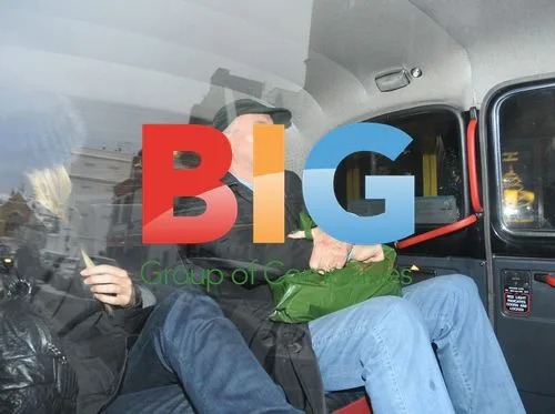 Monty Python Star John Cleese Hails Cab