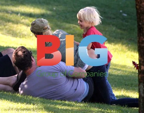Naomi Watts and Liev Schrieber with sons at park
