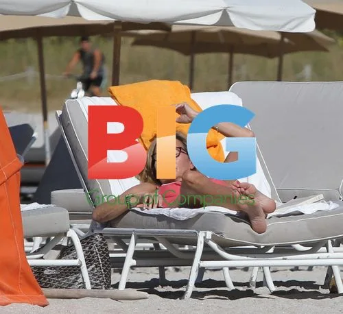 Claire Chazal Relaxing on Beach in Miami