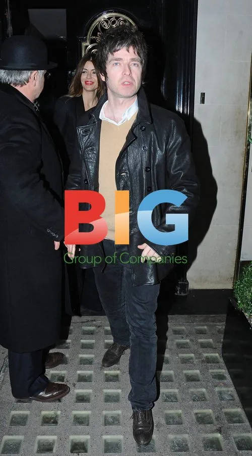 Noel Gallagher and Sara MacDonald Leaving Restaurant