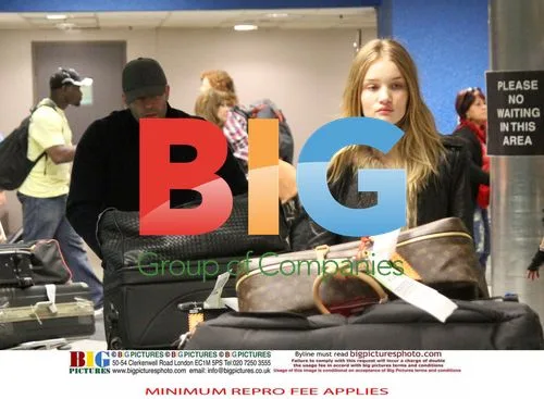 Jason Statham and Rosie Huntington-Whiteley at Airport