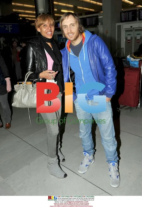David and Cathy Guetta Arrive in Paris