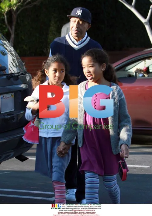 Russell Simmons Shopping with Daughters