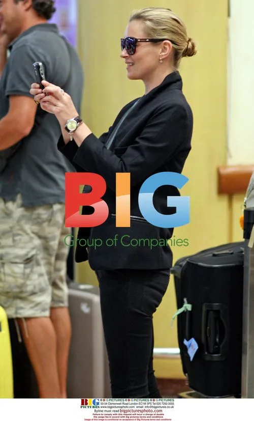 Kate Moss and family arrive at Phuket airport