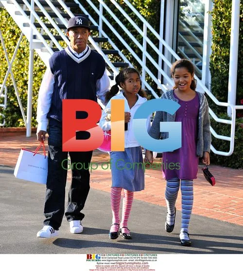 Russell Simmons with daughters at Fred Segal