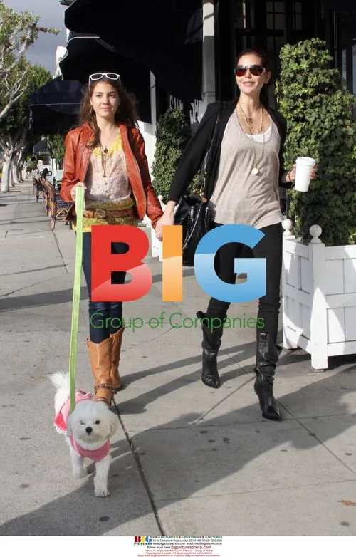 Teri Hatcher and Daughter Emerson Stroll with Dog