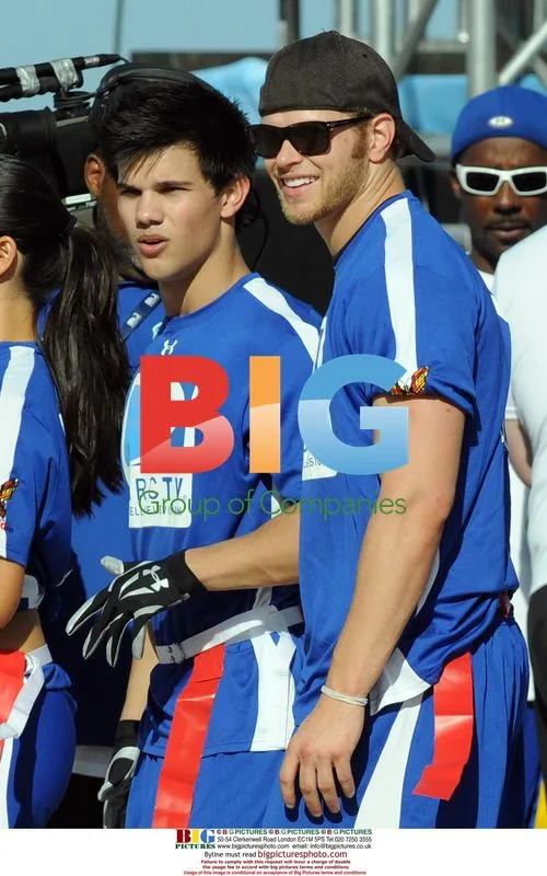 Taylor Lautner and Kellen Lutz at Celebrity Beach Bowl