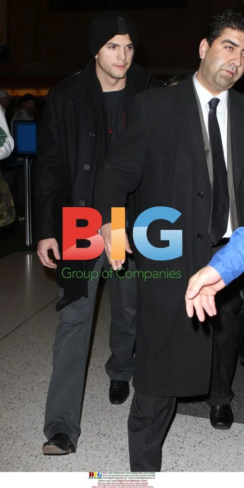 Ashton Kutcher and Demi Moore at LAX