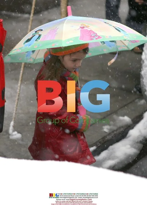 Katie Holmes and Suri Out in NYC Blizzard