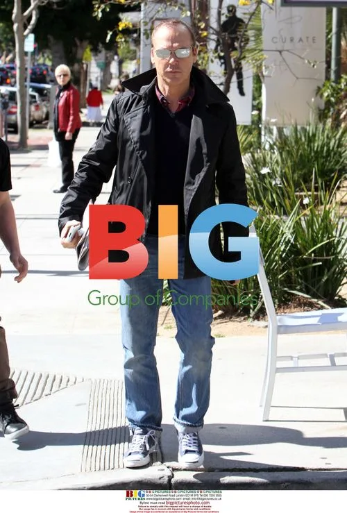 Michael Keaton Relaxes with Coffee and Newspaper