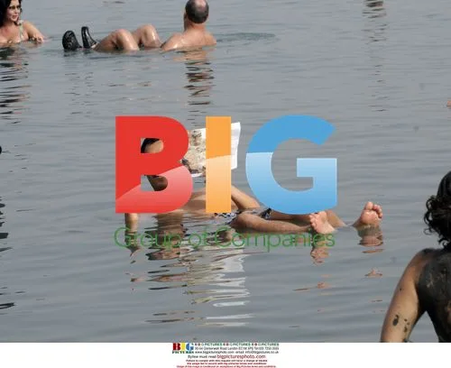 Tourists Enjoy Dead Sea in Israel