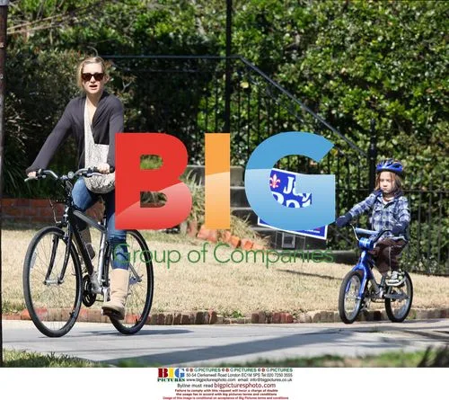Kate Hudson and son cycling in New Orleans
