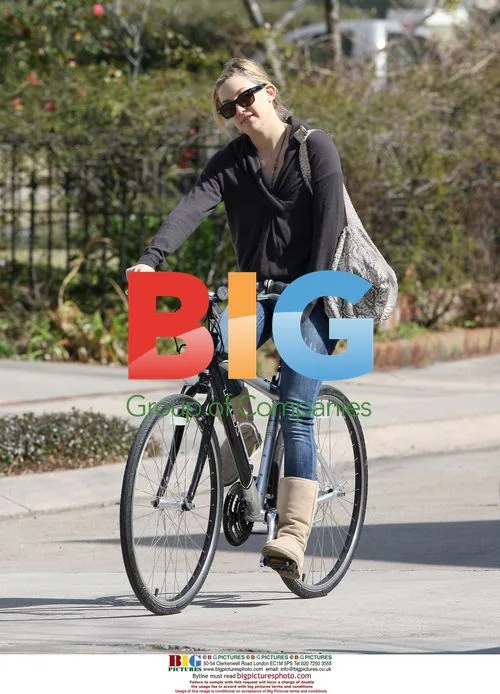 Kate Hudson and son cycling in New Orleans