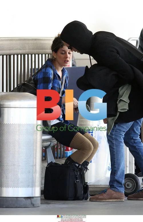 Shenae Grimes and Boyfriend Arrive at LAX