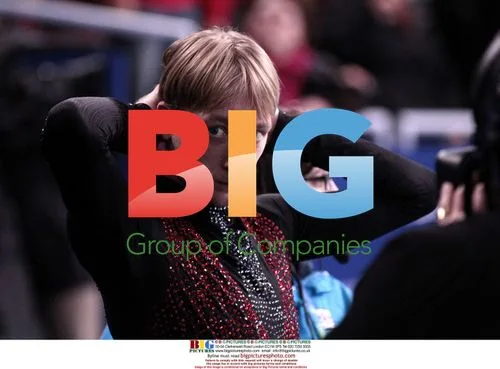 Evgeni Plushenko Waits for Medal Ceremony