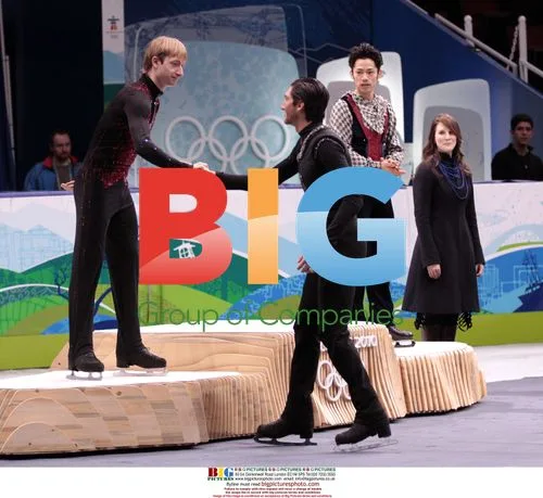 Evan Lysacek shakes hand with Evgeni Plushenko