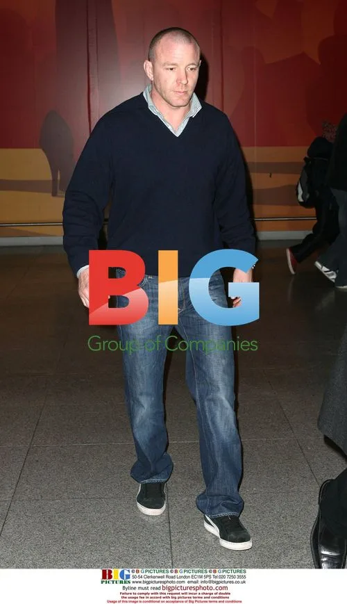 Guy Ritchie Arrives at JFK with Sons