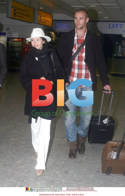 Dannii Minogue and Kris Smith at Heathrow