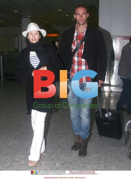 Dannii Minogue and Kris Smith at Heathrow