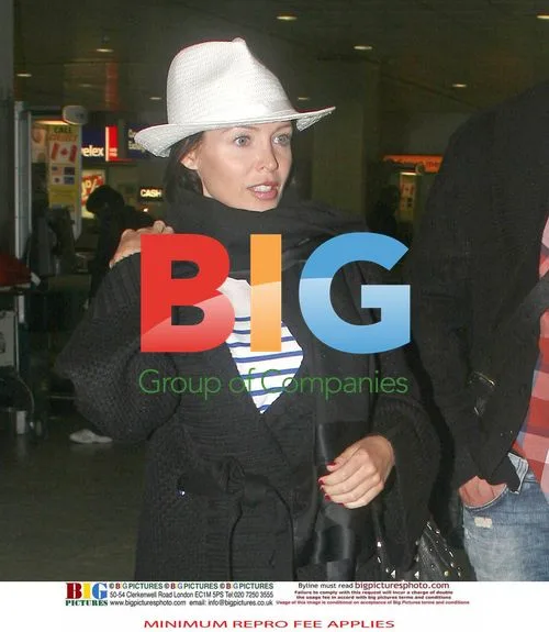 Dannii Minogue and Kris Smith at Heathrow