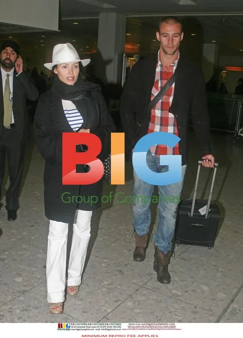 Dannii Minogue and Kris Smith return to Heathrow