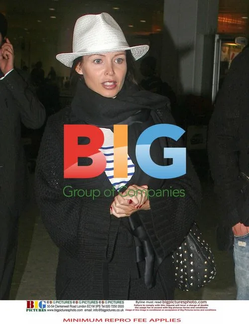 Dannii Minogue and Kris Smith at Heathrow