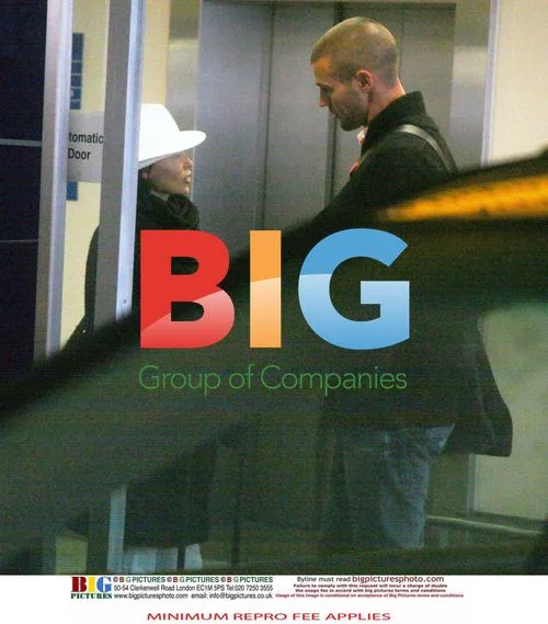 Dannii Minogue and Kris Smith at Heathrow