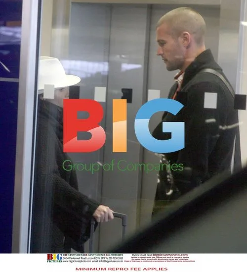 Dannii Minogue and Kris Smith Return to Heathrow