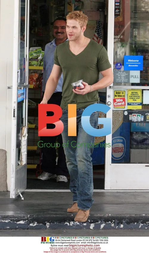 Kellan Lutz pumps gas, grabs snack