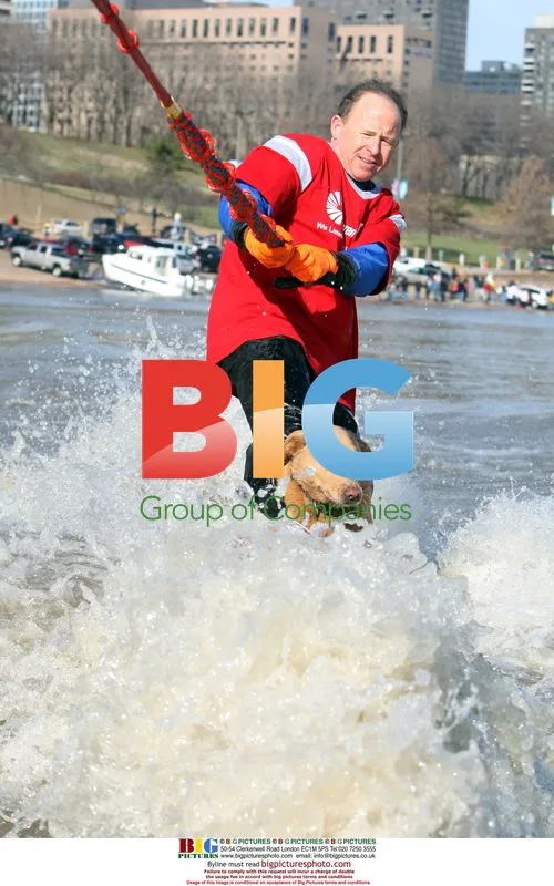 Kevin Day and dog ski on Mississippi River