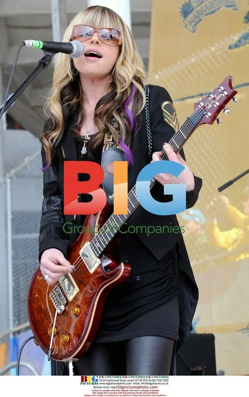 Orianthi Performs at NFL Game