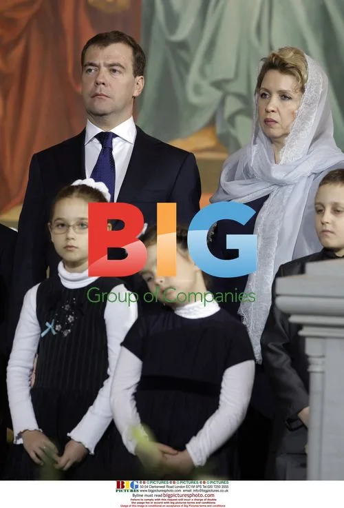 Medvedev and Wife Attend Christmas Service