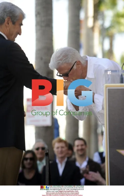 Ted Danson Kisses Sam Waterston's Hand
