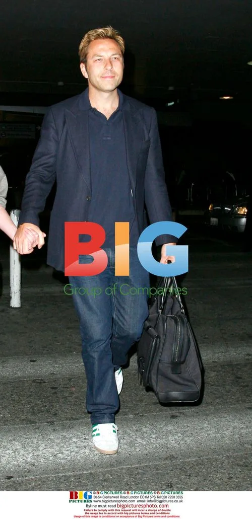 David Williams Leaving LAX with Girlfriend