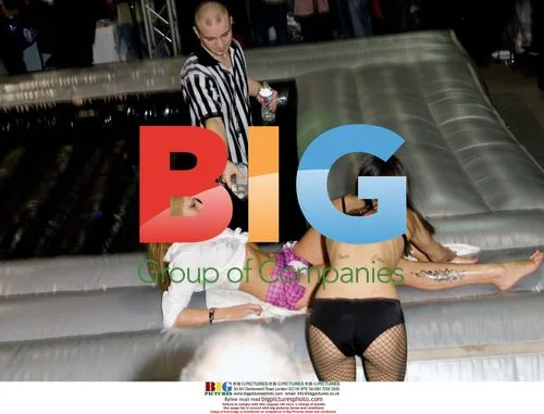 Adult entertainers oil wrestling at AVN Expo