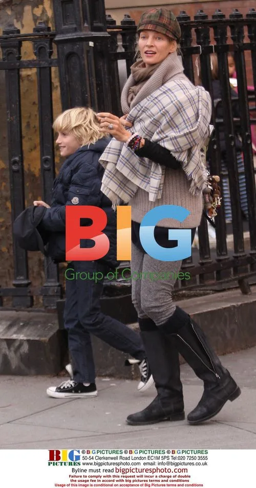 Uma Thurman picks up son from school