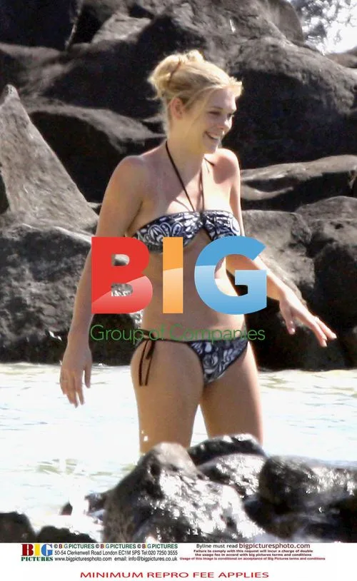 Prince Harry and Chelsy Davy on Beach