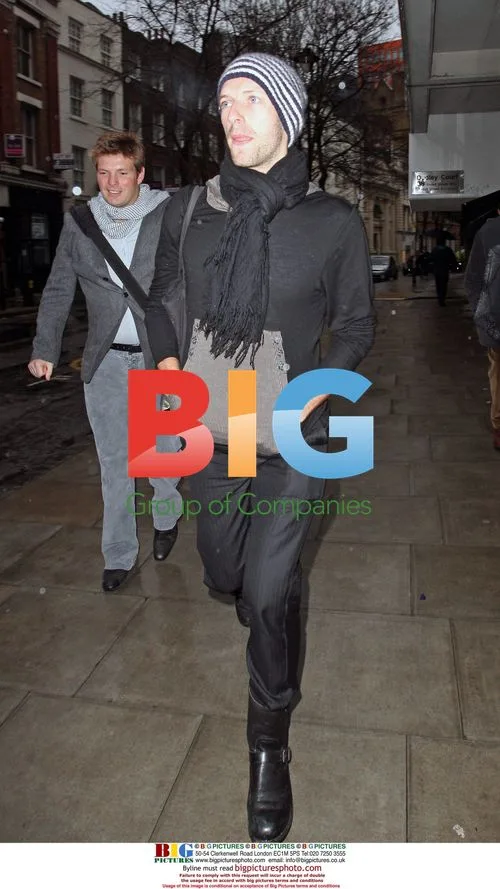 Coldplay members arrive at London hospital