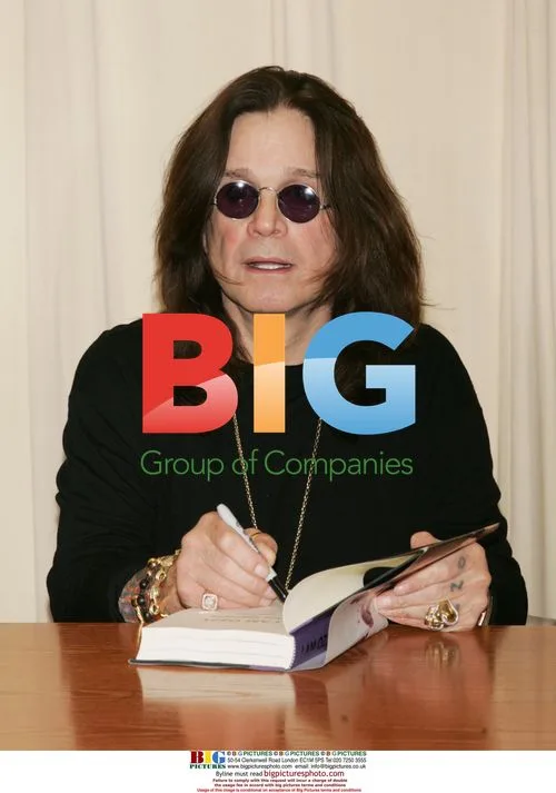 Ozzy Osbourne Signing Copies of 'I Am Ozzy'